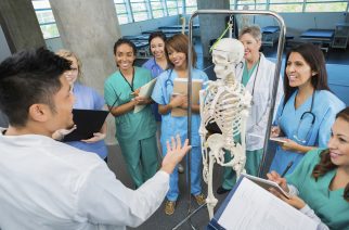 College professor teaching anatomy class to nursing or medical students